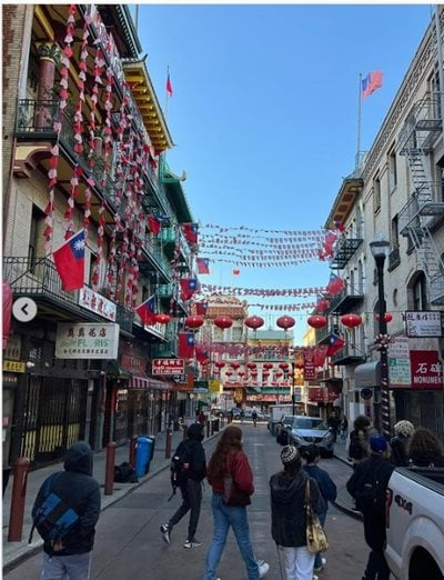 One of Chinatown's alleys, with lanterns hanging overhead.