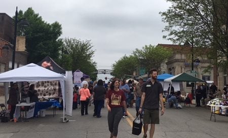 A celebration in Des Moines shows people on the streets.