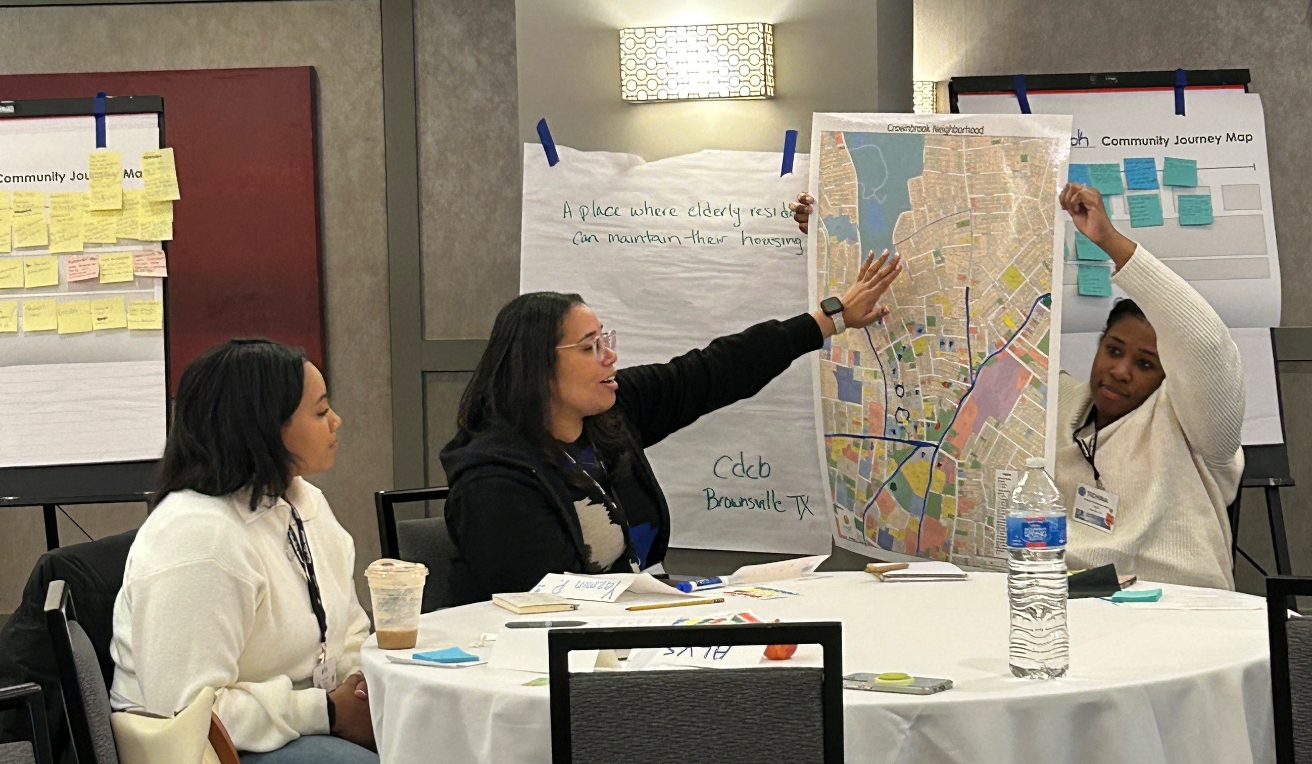 CCD class during the training institute. Students map out their communities and flag the good things and the challenges.