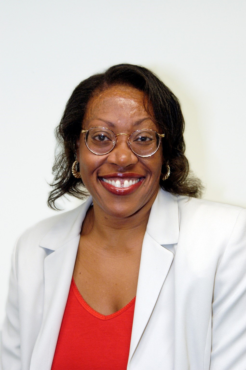Gail Latimore smiles at the camera.