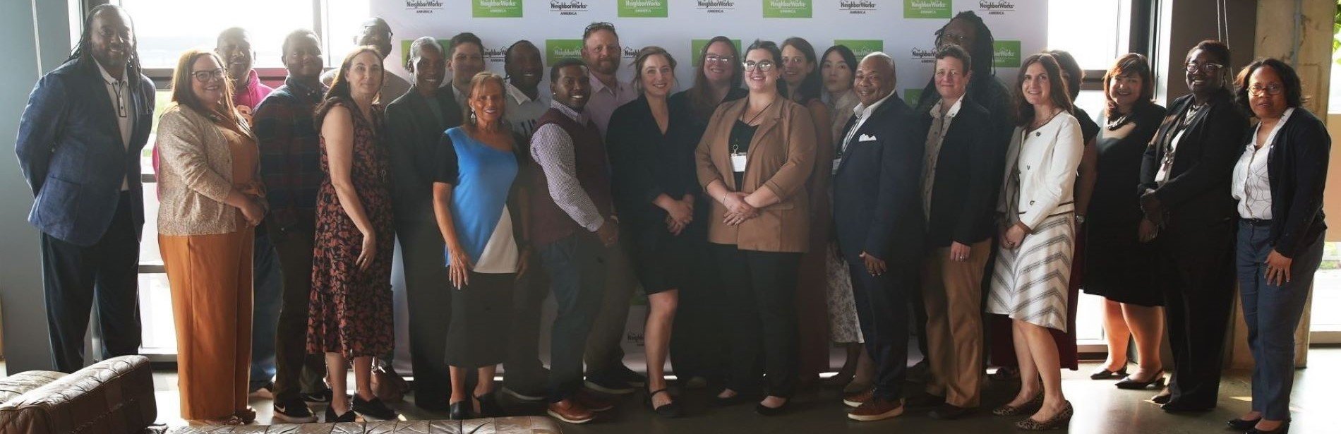 The full cohort gathered at NeighborWorks with President & CEO Marietta Rodriguez and NeighborWorks trainers, officers and staff.