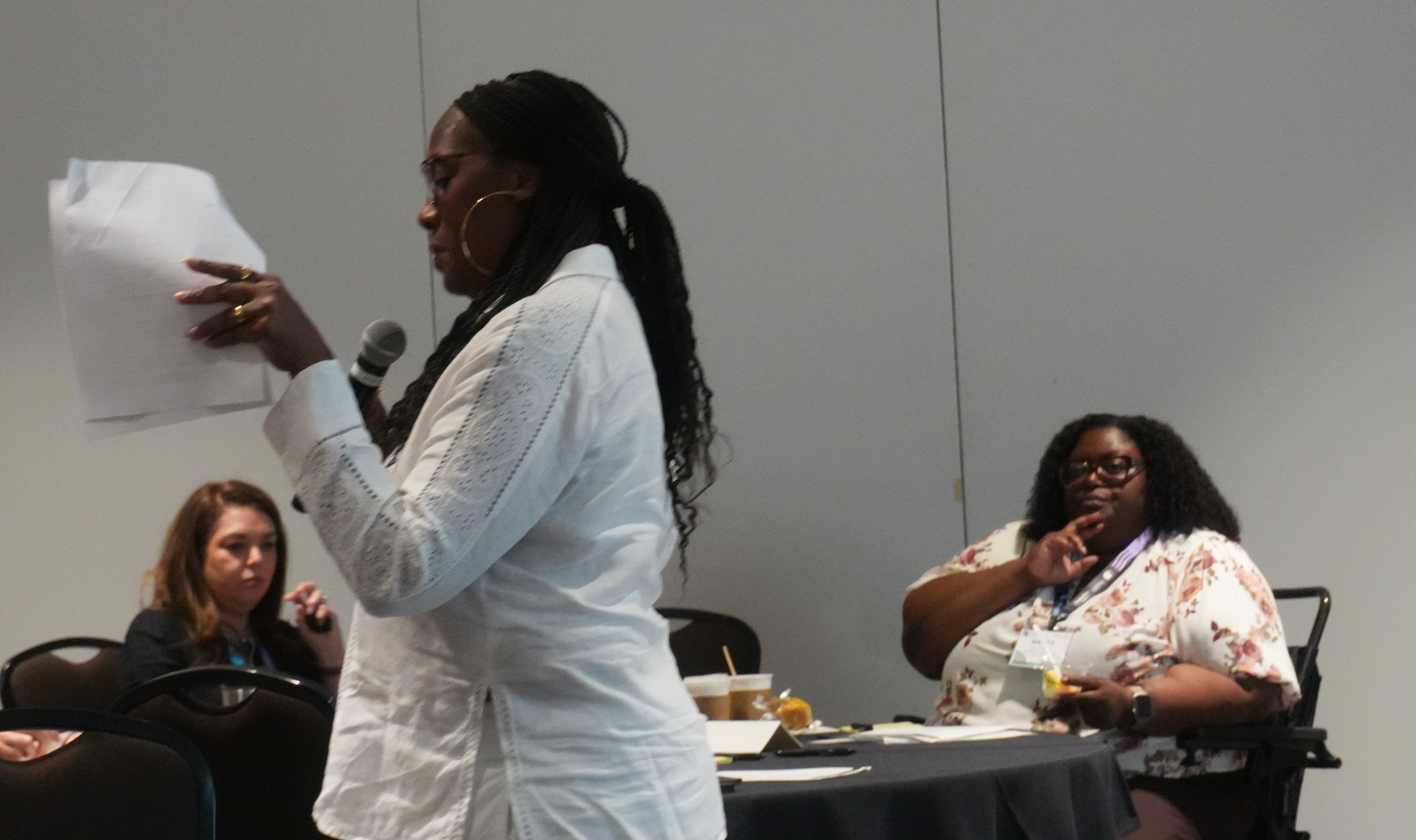 Sheila Anderson speaks while Nancy Durand listens on.