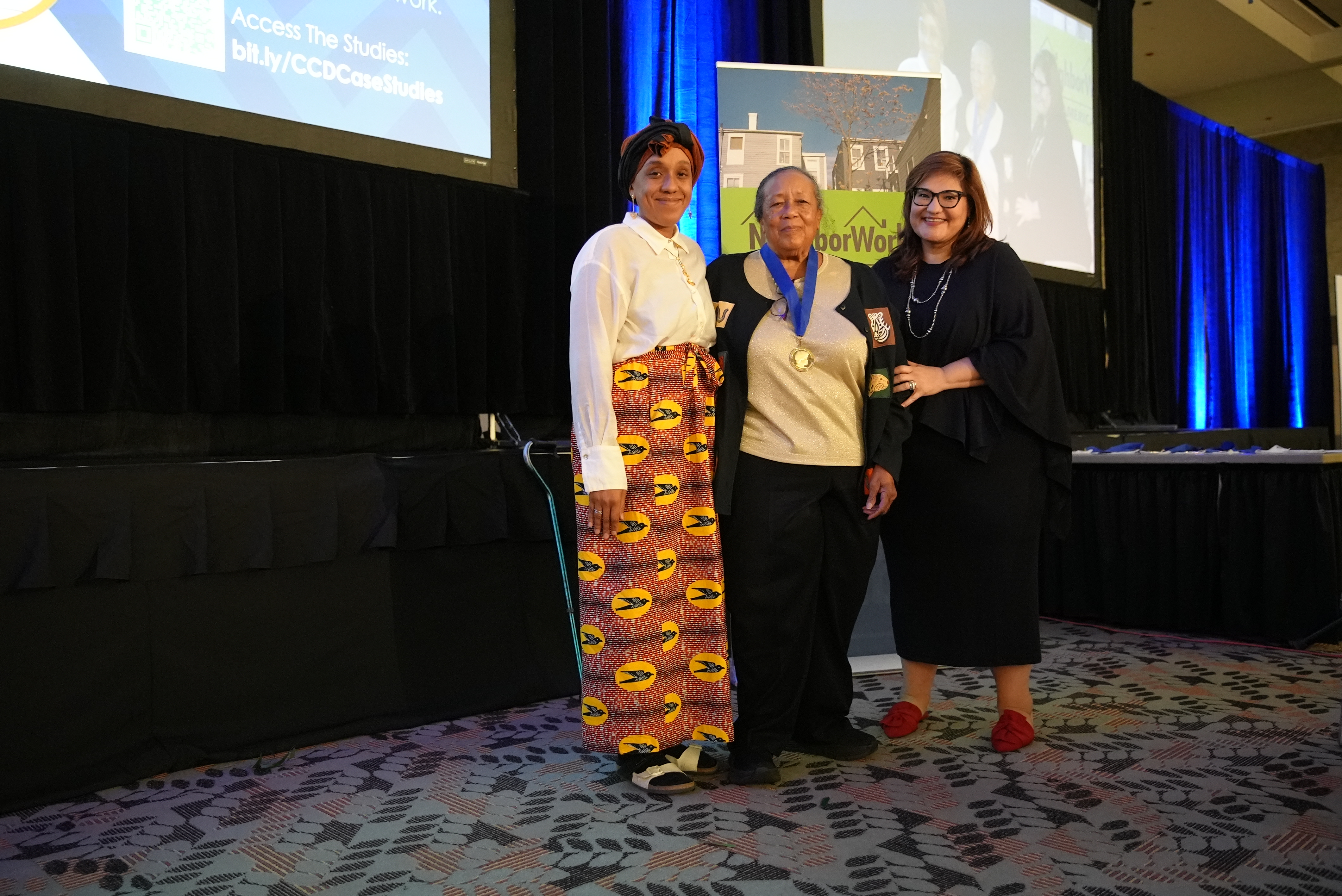 Dorothy Richardson Award for Resident Leadership honoree Elnora Jefferson with her daughter and Marietta Rodriguez.