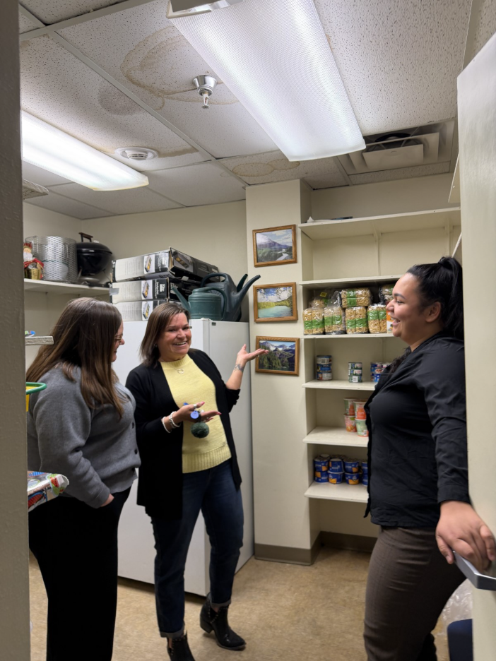 Staff get a tour of The Adelaide, a Single Room Occupance building.