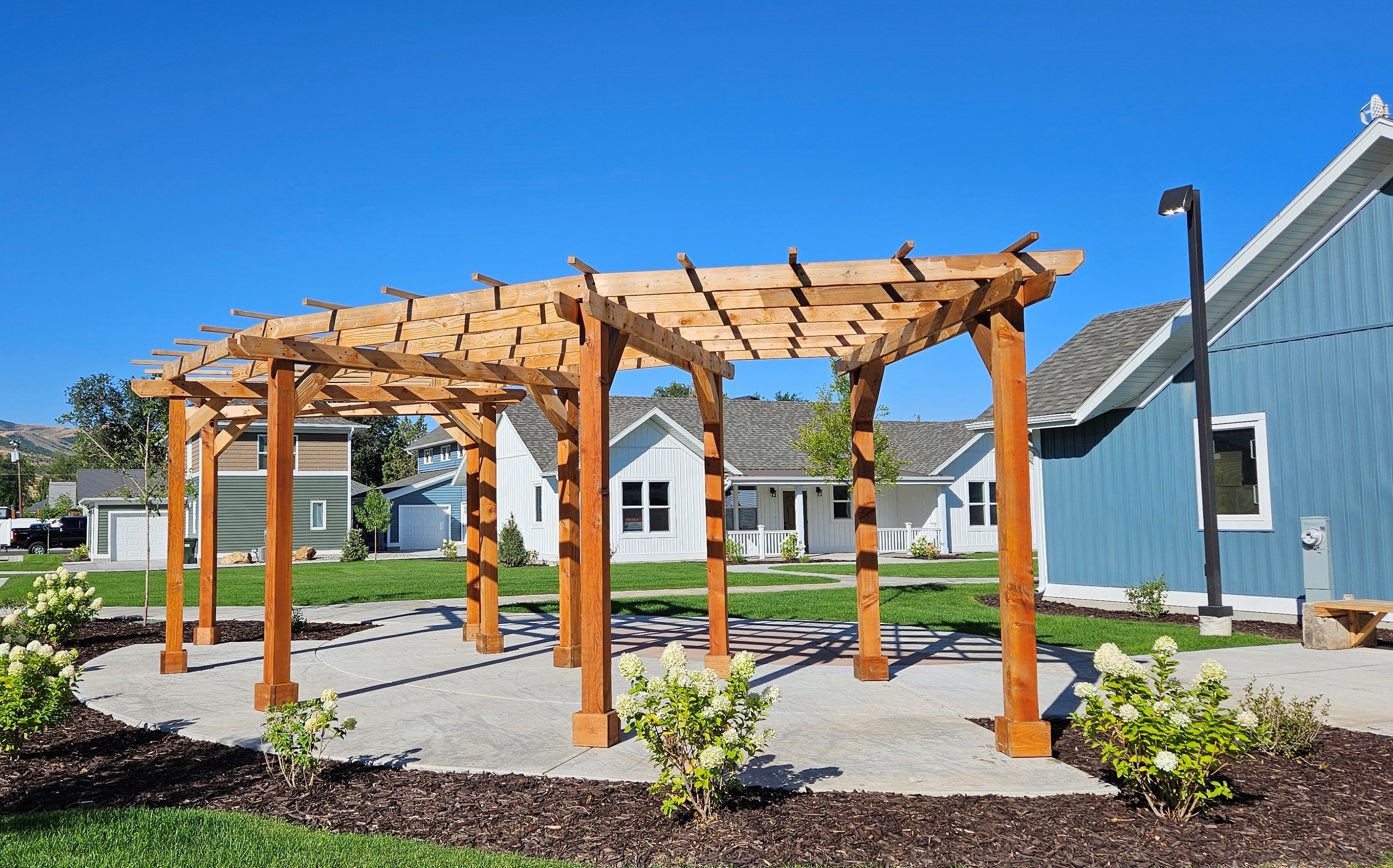 The pergola needed sanding and painting. Dawson Bowcut helped with that and more.