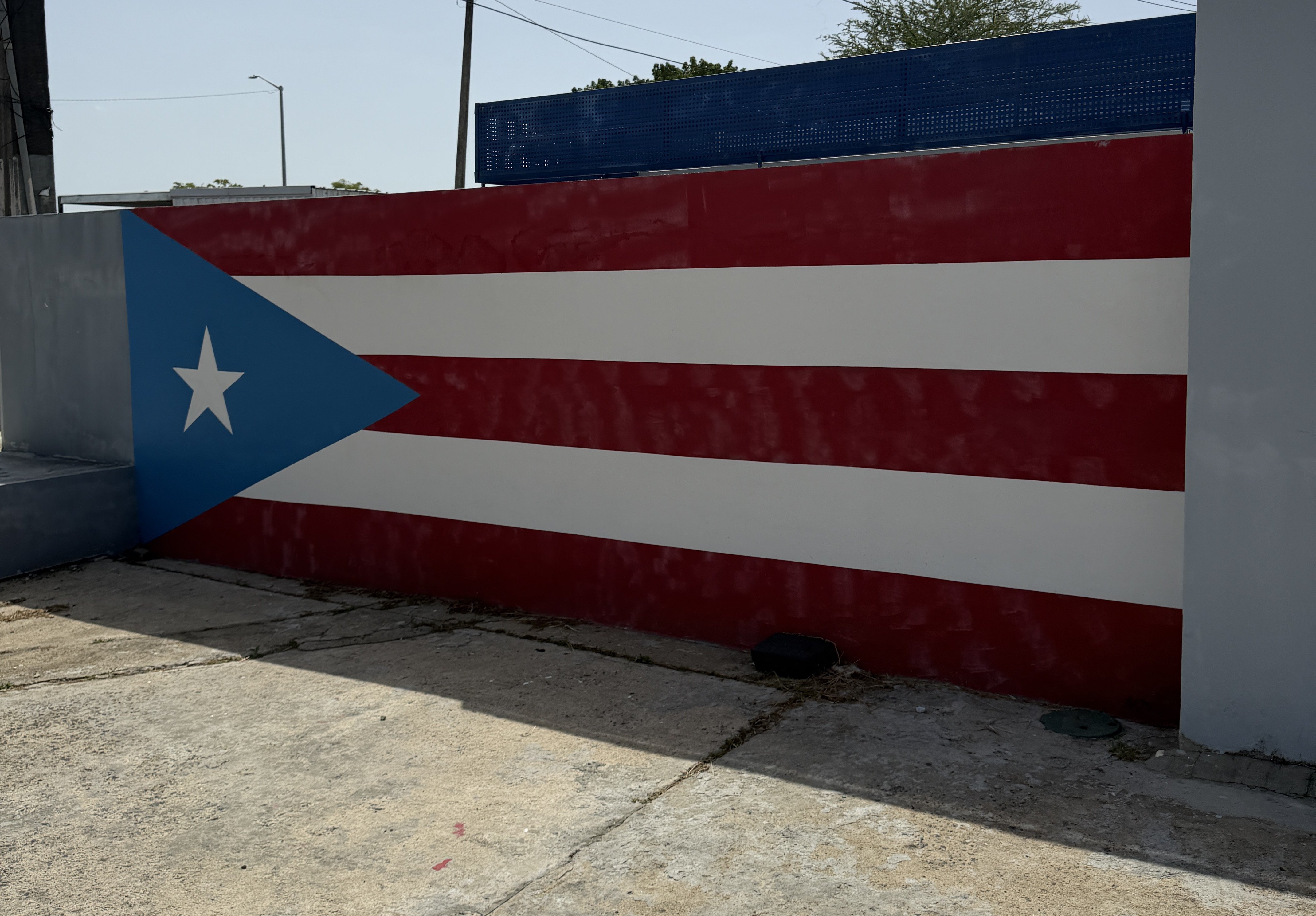 The flag of Puerto Rico is across the island.