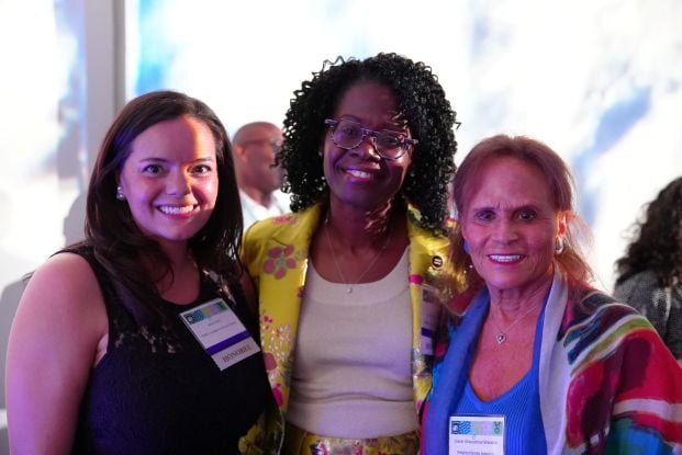 Award recipients stand with Joanie Straussman Brandon.