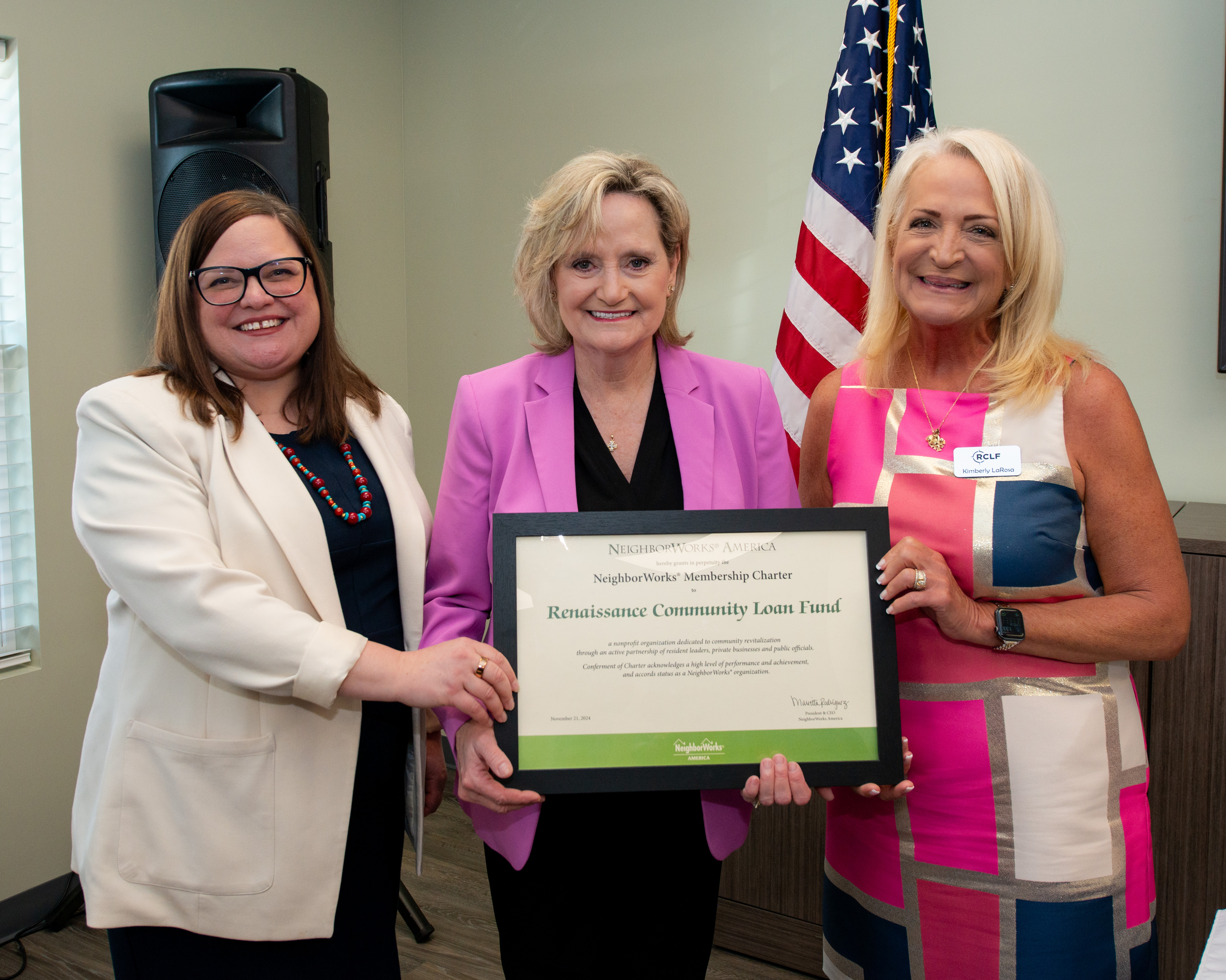 Sen. Cindy Hyde-Smith with Katie Watts of NeighborWorks America and Kimberly LaRosa of RCLF