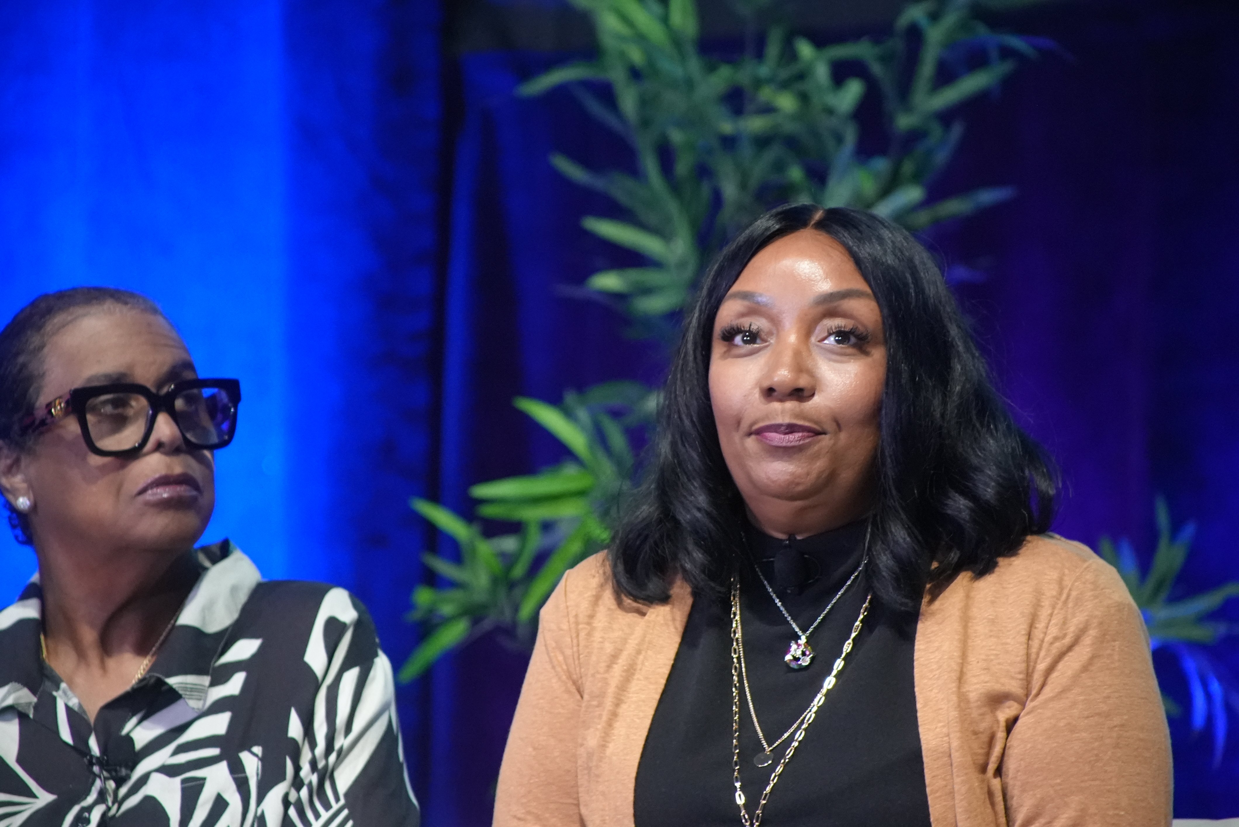 Jackie Caldwell and Kareema Pinder against a blue background.