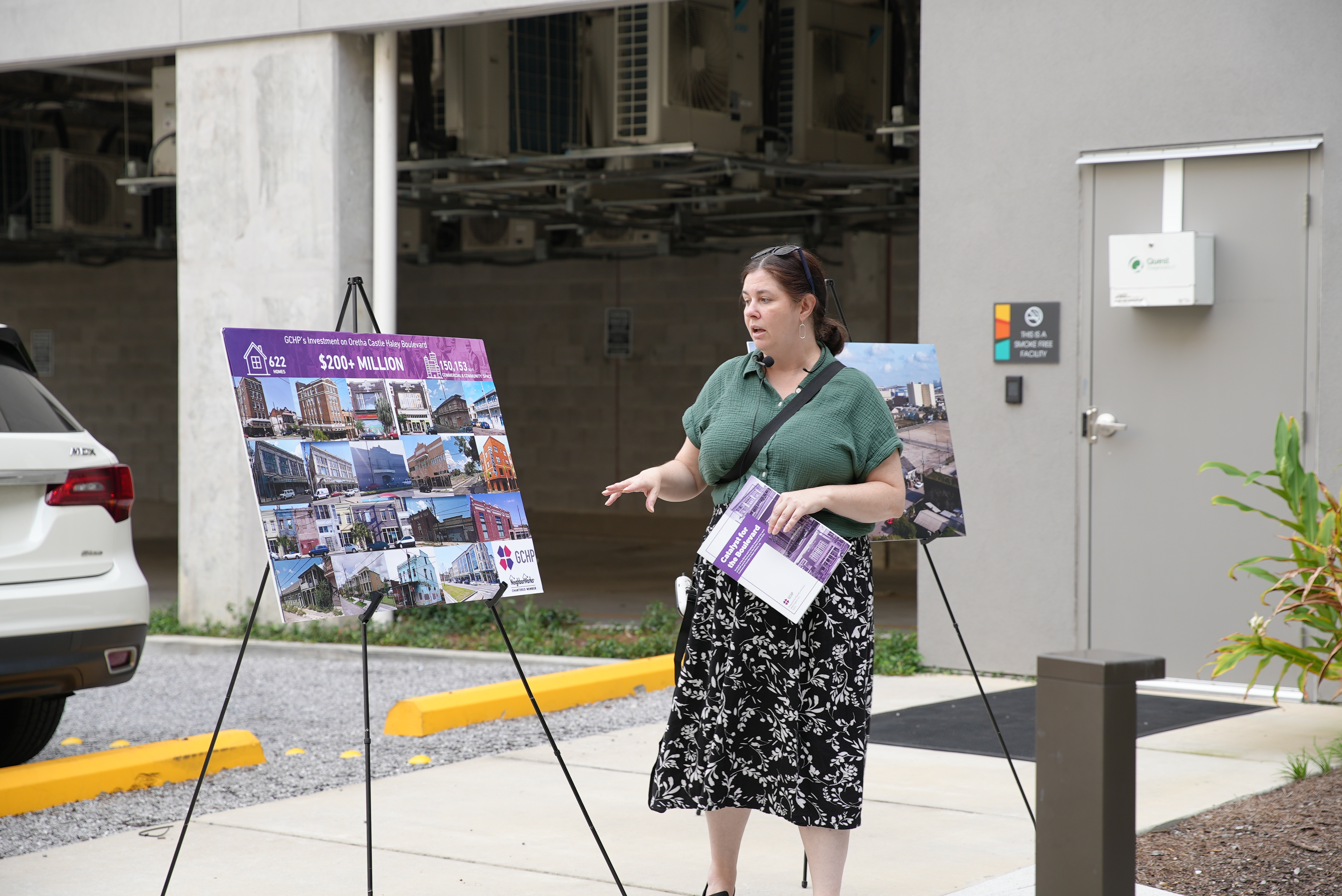 The poster shows the before and after of properties Providence has developed.