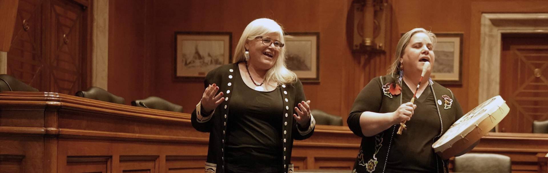 Jacqueline Pata and Jamie Gomez open the chartering event at the Senate office building.
