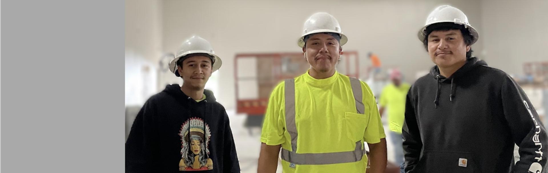Interns learn building skills to fill the need on Native land.