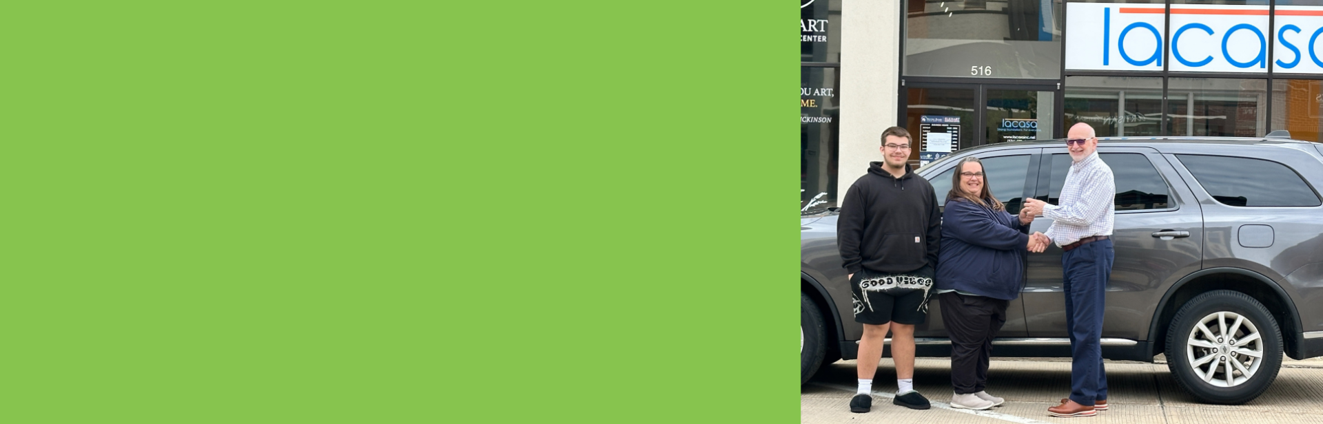 A family buys a new car through a loan program at Lacasa.