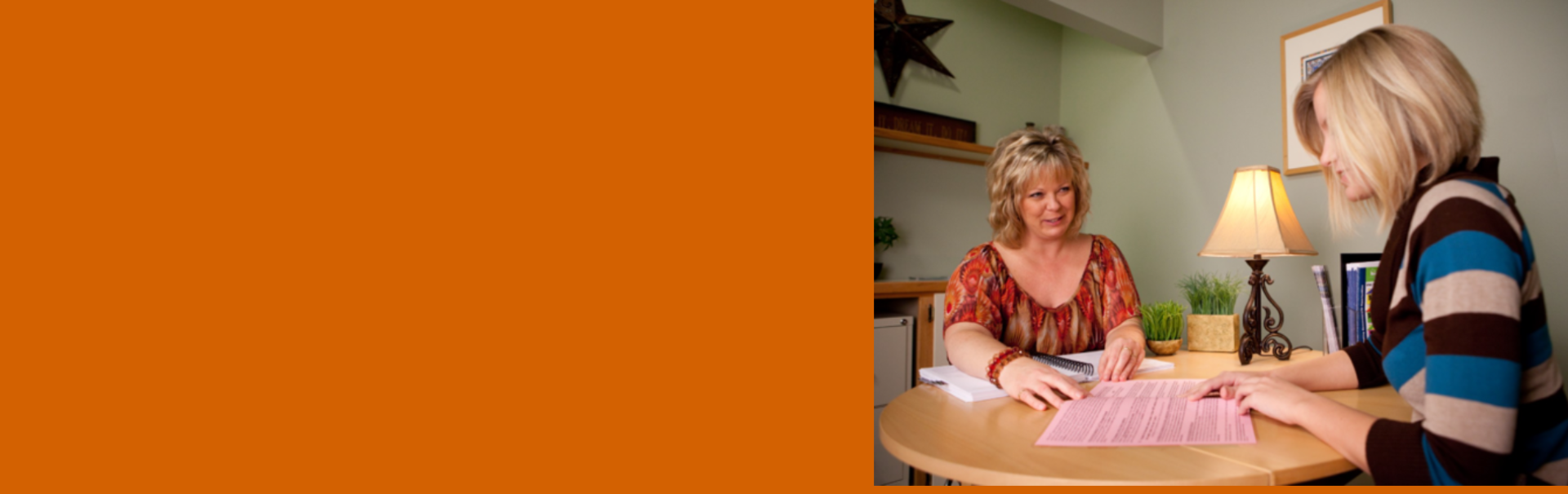 A woman receives housing counseling.