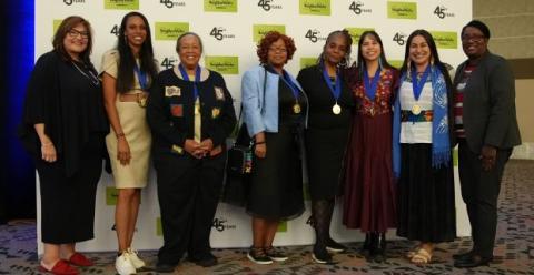 Dorothy Richardson Award for Resident Leadership honorees stand with Marietta Rodriguez, president & CEO of NeighborWorks America.