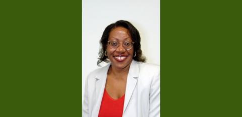 Gail Latimore of Codman Square smiles at the camera.