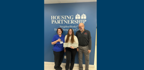 Presenting the keys to Yarimar before she moves into her new home.