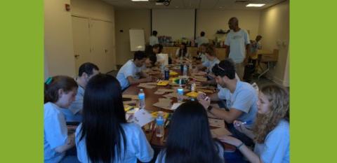 A group of NeighborWorks staff and internets helps during NeighborWorks Weeks.